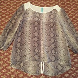 Francesca’s snakeskin blouse